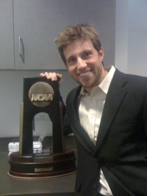Coach Brazill and his NCAA trophy