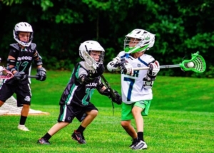 HGR Boys playing lacrosse outsite