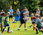 HGR kids on the field playing soccer and lacrosse
